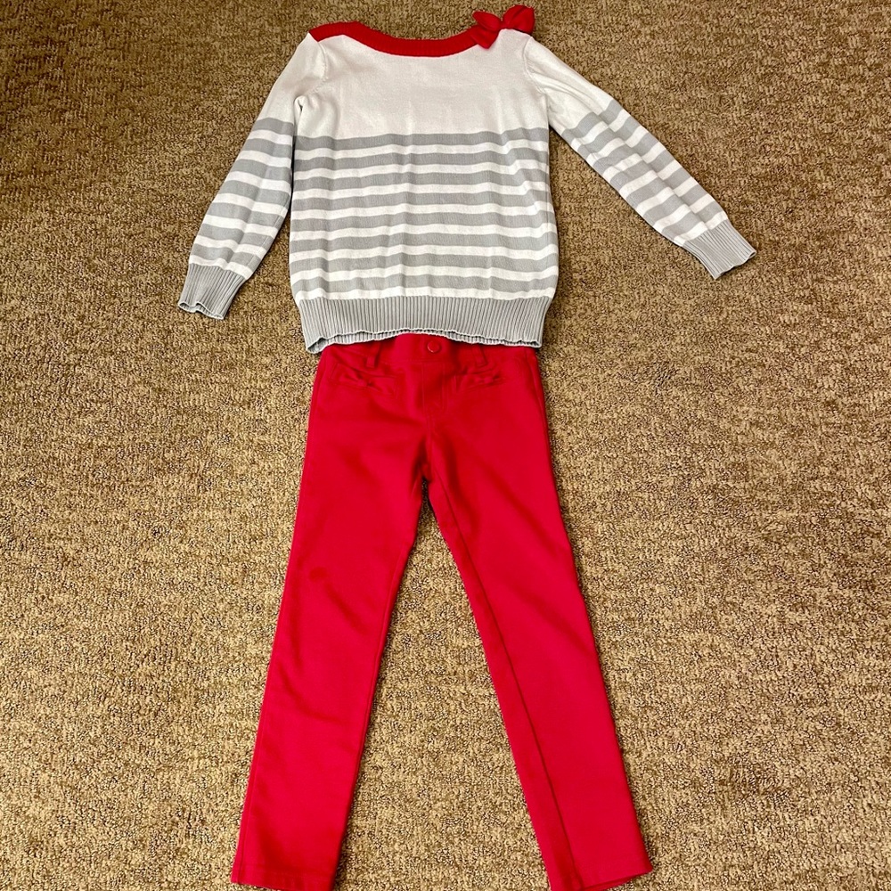 Gymboree sweater with red pants.